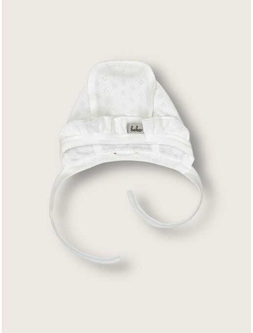 Молочный трикотажный  ажурный чепчик с с рюшей для новорожденных девочек Bebo