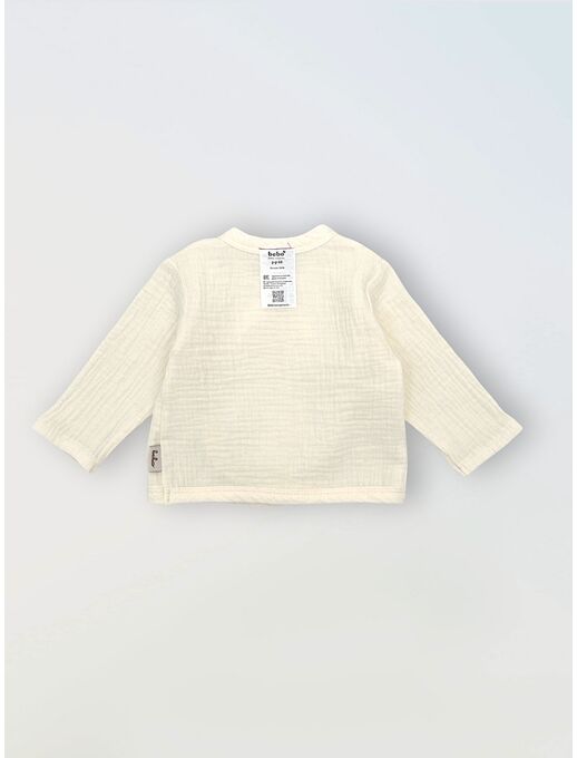 Муслиновая распашонка на завязках с глубоким запахом и антицарапками. экрю