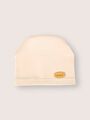 Детская шапочка для новорожденного Bebo лаконичная, Бежевый