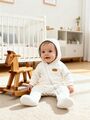 Теплый комбинезон для новорожденного из футера